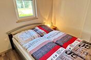 Schlafzimmer mit Doppelbett