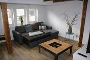 Couch im Wohnzimmer (umfunktioniert zur Schlafcouch)